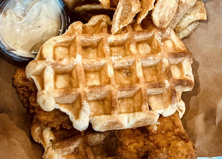 Troll Pub Under the Bridge signature dishes Angry AlfredoPot Roast PoutineFried Chicken and Waffles